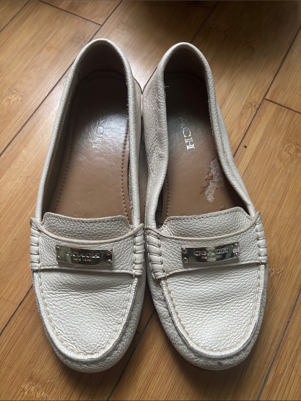Coach Cream Leather Driving Loafers with Metallic Logo Plaque
